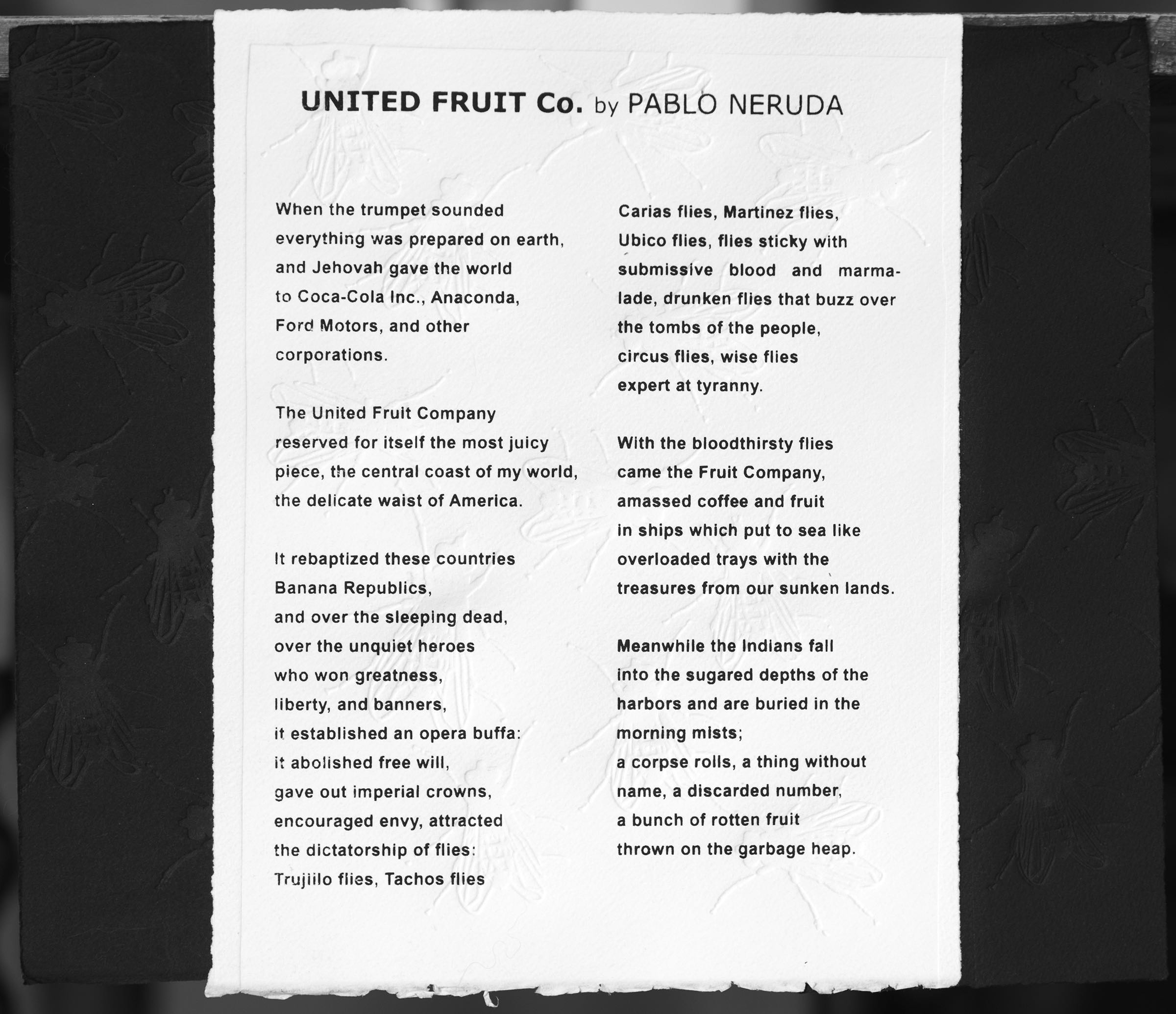 Neruda embossment featuring poem by Pablo Neruda and embossed flies.